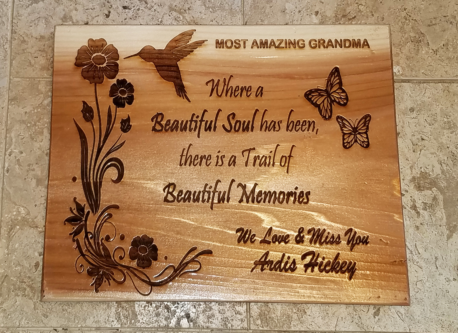 Most Amazing Grandma Memorial Plaque made out of Cedar Board that was clear-coated and says: Where a Beautiful Soul has Been, There is a Trail of Beautiful Memories Quote.